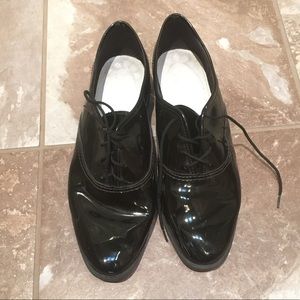 Shiny dress shoes.